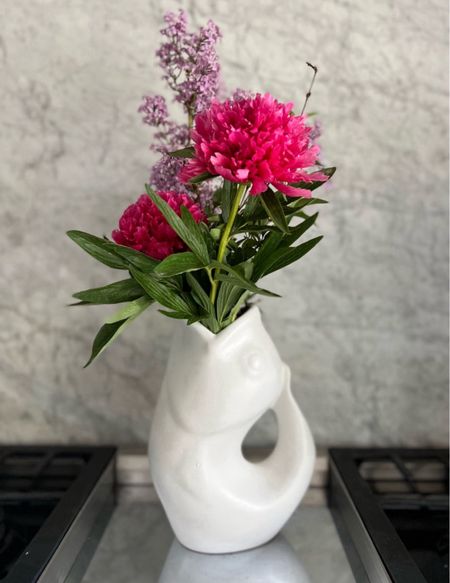 Have you ever seen a gurgle pot before? This item is a big favorite of mine from Amazon! Pretty much any florals look great in it or it is great for its intended purpose, water. The best part is…it makes a gurgling sound when you pour the water out!


#LTKFindsUnder50 #LTKHome #LTKFindsUnder100