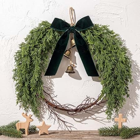 Amazon.com: Suncalla 12" Artificial Christmas Cedar Wreath with Green Bow | Winter Touch Cypress Soft Wreath with Hanging Bells and Twigs, Farmhouse Rustic Xmas Swag for Door Window Wall Mantel Decor | Amazon (US)