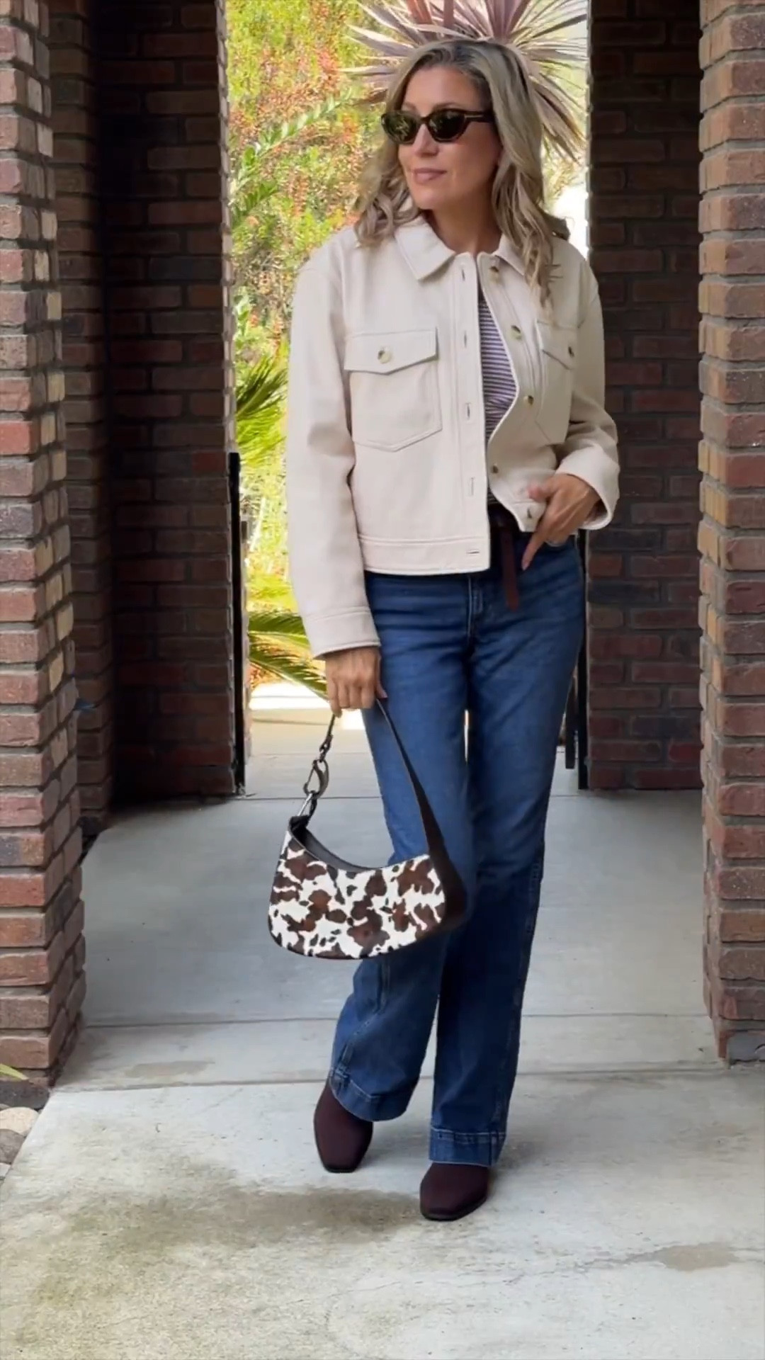 Fall's Most Versatile Jacket is HERE! 🤍

Meet my new obsession: The **Ivory Leather Shirt Jacket** from Quince (linked!). This piece is buttery soft, incredibly chic, and the perfect neutral layer to transition into fall. I love the trucker style and the luxe feel of the leather—it looks SO much more expensive than it is.

Styled here with one of my favorite bootcut Wrangler denim jeans and a fun cow-print bag for an effortlessly cool, high-low look.

Tap to shop this jacket before it sells out—it's already a best-seller!

#quince #quincehaul #leatherjacket #leathershacket #ivoryjacket #creamjacket #falljacket #fallfashion #transitionalstyle #neutralstyle #elevatedbasics #truckerjacket #flaredjeans #cowprint #ltkfall #ltkstyle #affordableluxury #shacket



#LTKOver40 #LTKSeasonal #LTKItBag