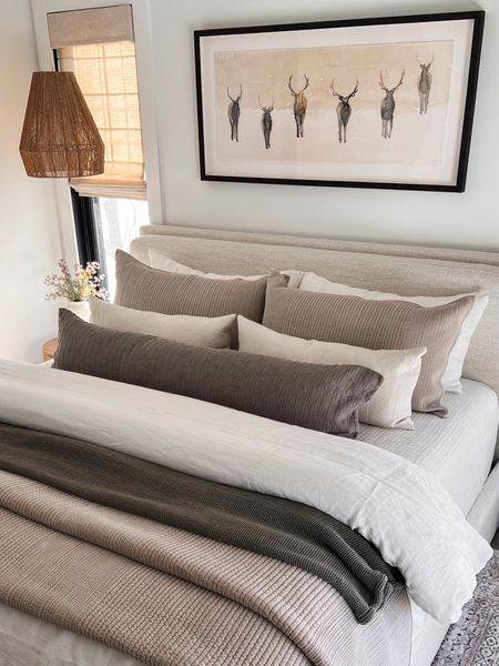 Layers of bedding for a designer look , framed artwork, pendant lighting 

#LTKstyletip #LTKhome