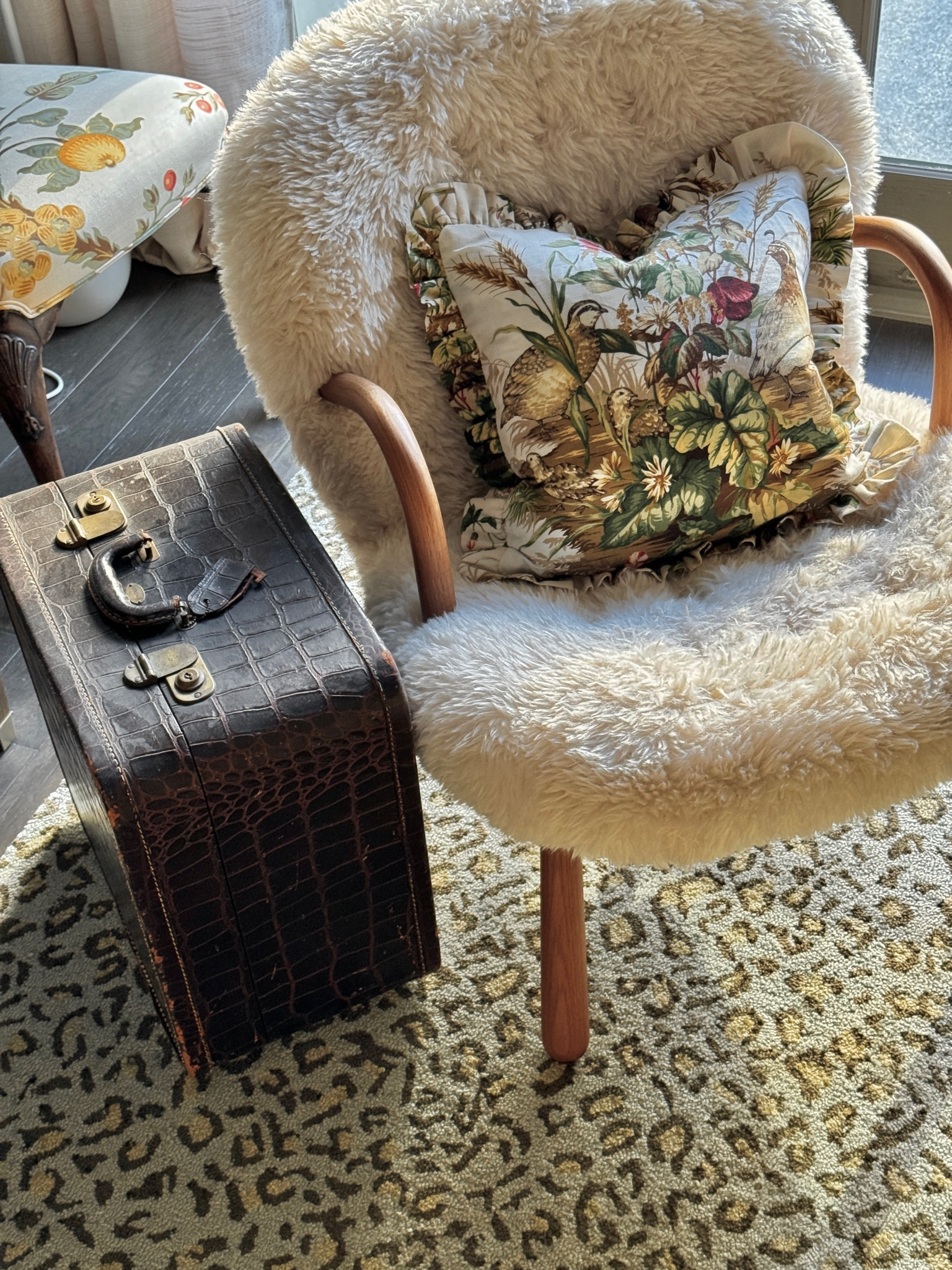 Cozy sheepskin armchair with designer floral pillow fabric, midcentury sheepskin Clam Chair, Eternity Modern furniture, Scalamandre fabric, ruffled throw pillow, living room decor ideas, interior design inspiration

#LTKHome #LTKStyleTip