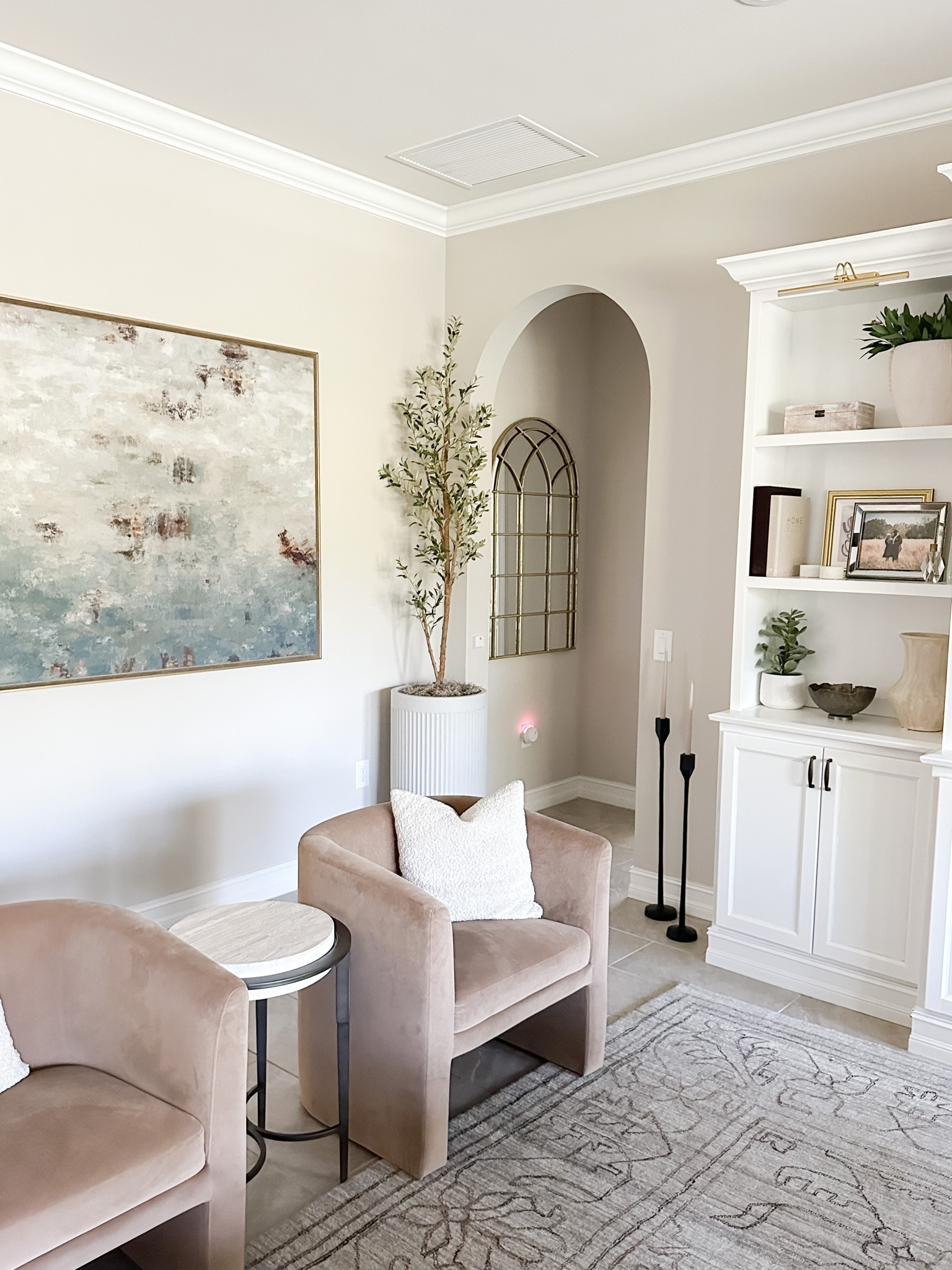 Tree styling hack! I use this on every faux tree in my home. It just makes everything look nicer! My fluted planters are a Pottery Barn dupe, and another great thing about them is that they are lightweight and easy to move around. 

Fluted planter, at home, planter, pottery barn planter, tree styling hack, faux olive tree, nearly natural tree 

#LTKunder100 

#LTKhome