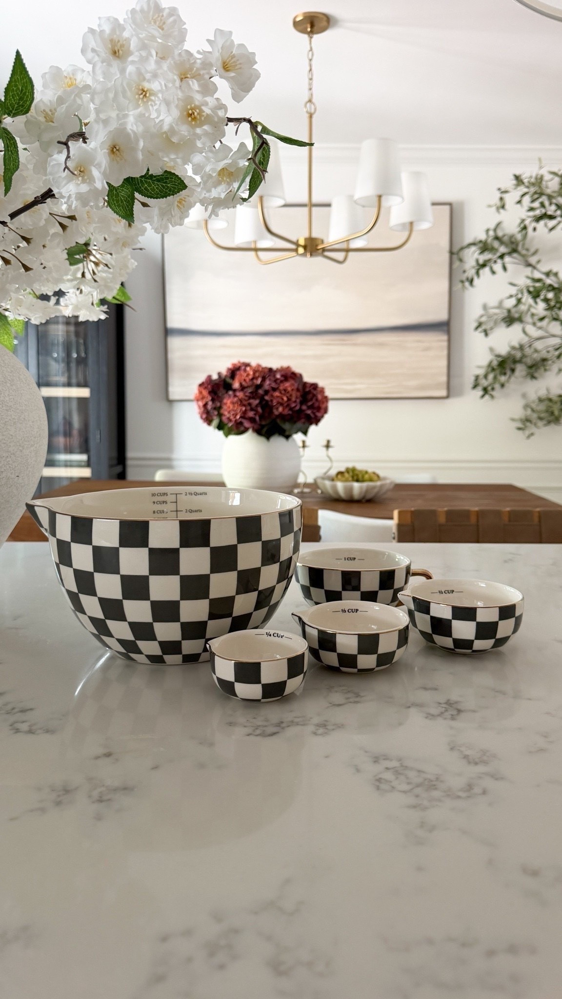 Mackenzie-Childs vibes without the Mackenzie-Childs price tag. 👀🤎

I’m obsessed with these checkered measuring bowls! The pattern is so charming and timeless, and the entire set is pretty enough to keep on display instead of hiding it away in a cabinet.

It’s one of those little kitchen finds that makes everyday moments feel a bit more special—and the price makes it even better. ✨

#LTKHome #LTKSeasonal #LTKmomlife
