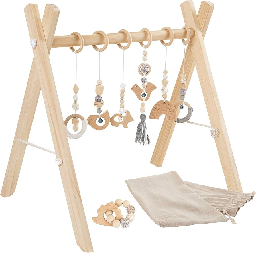 Sleepy Spirits Wooden Baby Play Gym with 7 Toys - 6 Hanging Toys and 1 Teether Bracelet with Trav... | Amazon (US)