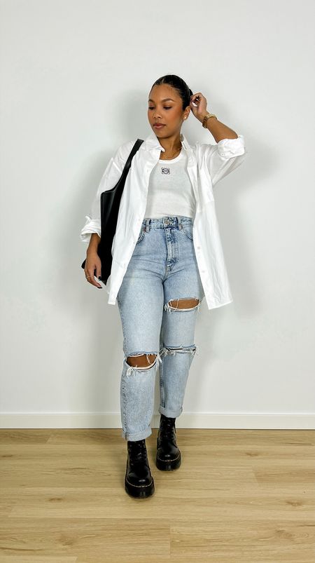 Casual Spring Outfit. Spring 2023 fashion, denim look, ripped denim jeans, minimal fashion, casual chic outfit, White Loewe tank top, Dr.Marten boots, White Frankie Shirt, Everlane Cactus Triangle Tote.

#LTKcurves #LTKeurope #LTKstyletip