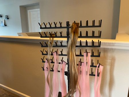 A metal stand to hold all my hair extensions
👏 no more tangles and getting messed up
💓can hold a lot of extensions or wigs

#LTKFindsUnder50 #LTKBeauty #LTKFindsUnder100