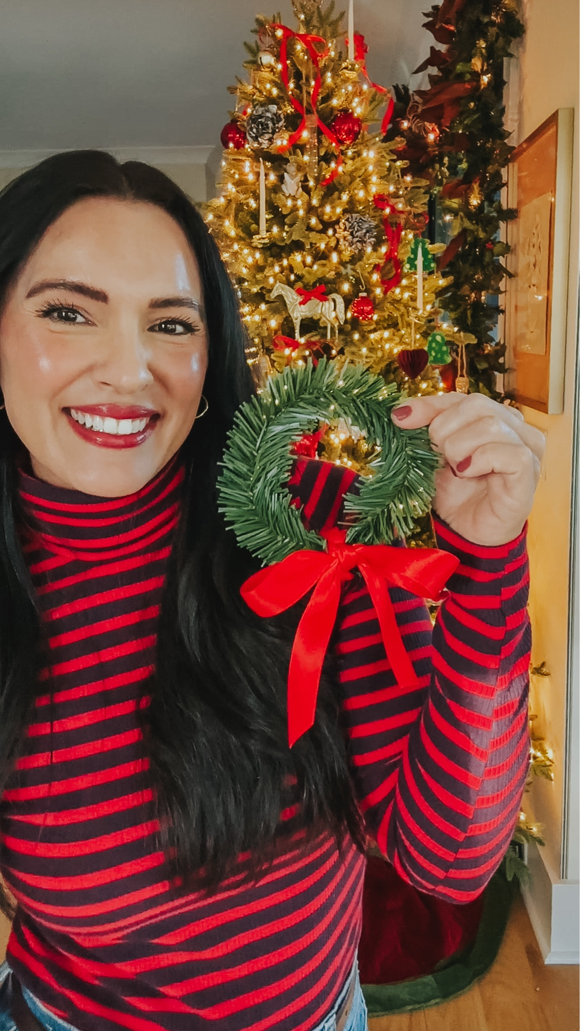 I make a bunch of these at the start of the holiday season and use them for all sorts of things. ♥️🌲They make great gift embellishments! Linking to the garland ties and my favorite satin ribbon here, plus home sources featured in this reel. 

PS - my striped turtleneck is just $14! ♥️

#LTKHoliday #LTKHome #LTKStyleTip