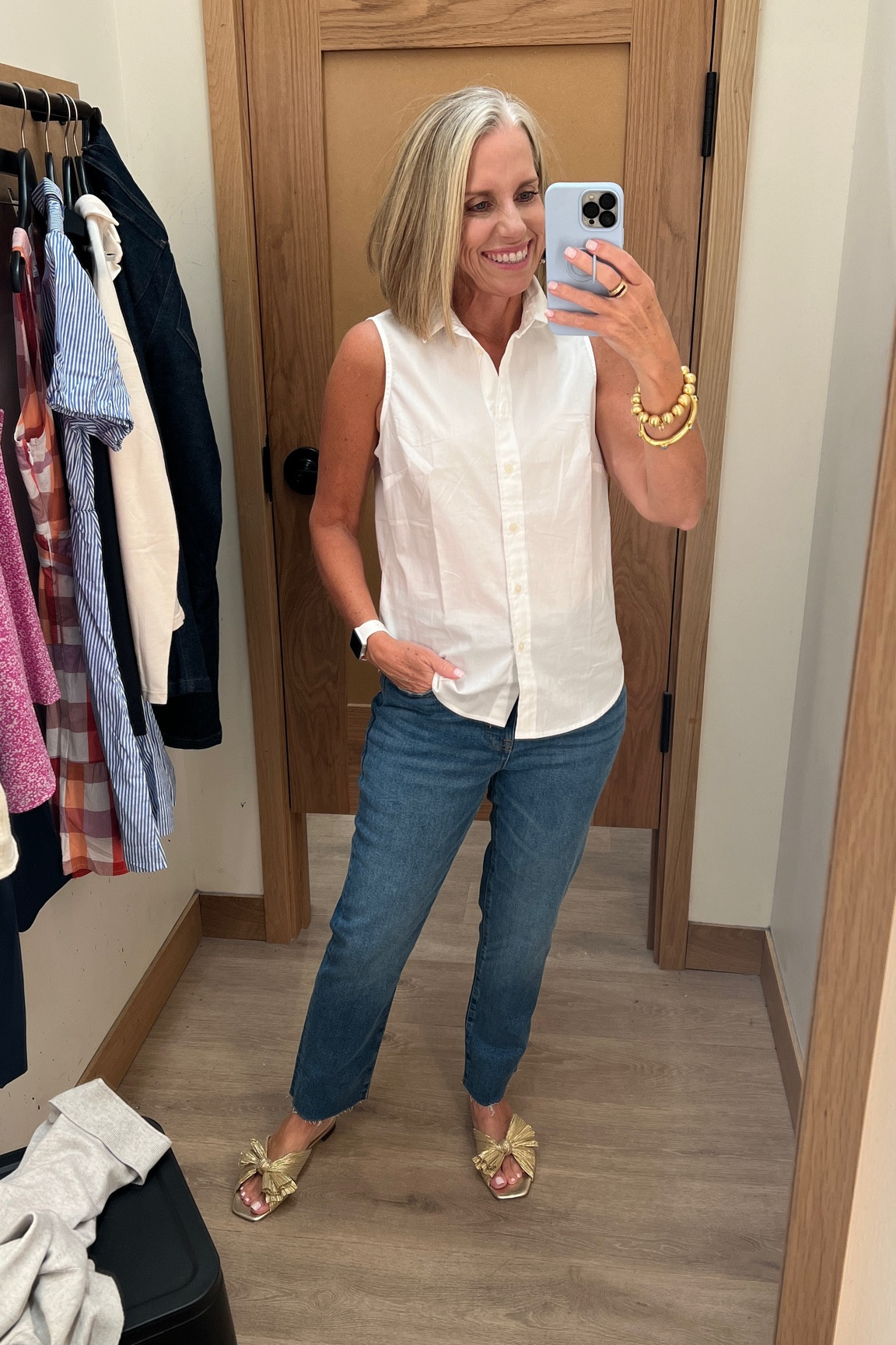 The easiest outfit formula is a white shirt and jeans. A sleeveless white shirt makes layering a breeze. 

#LTKFind #LTKover40 #LTKsalealert