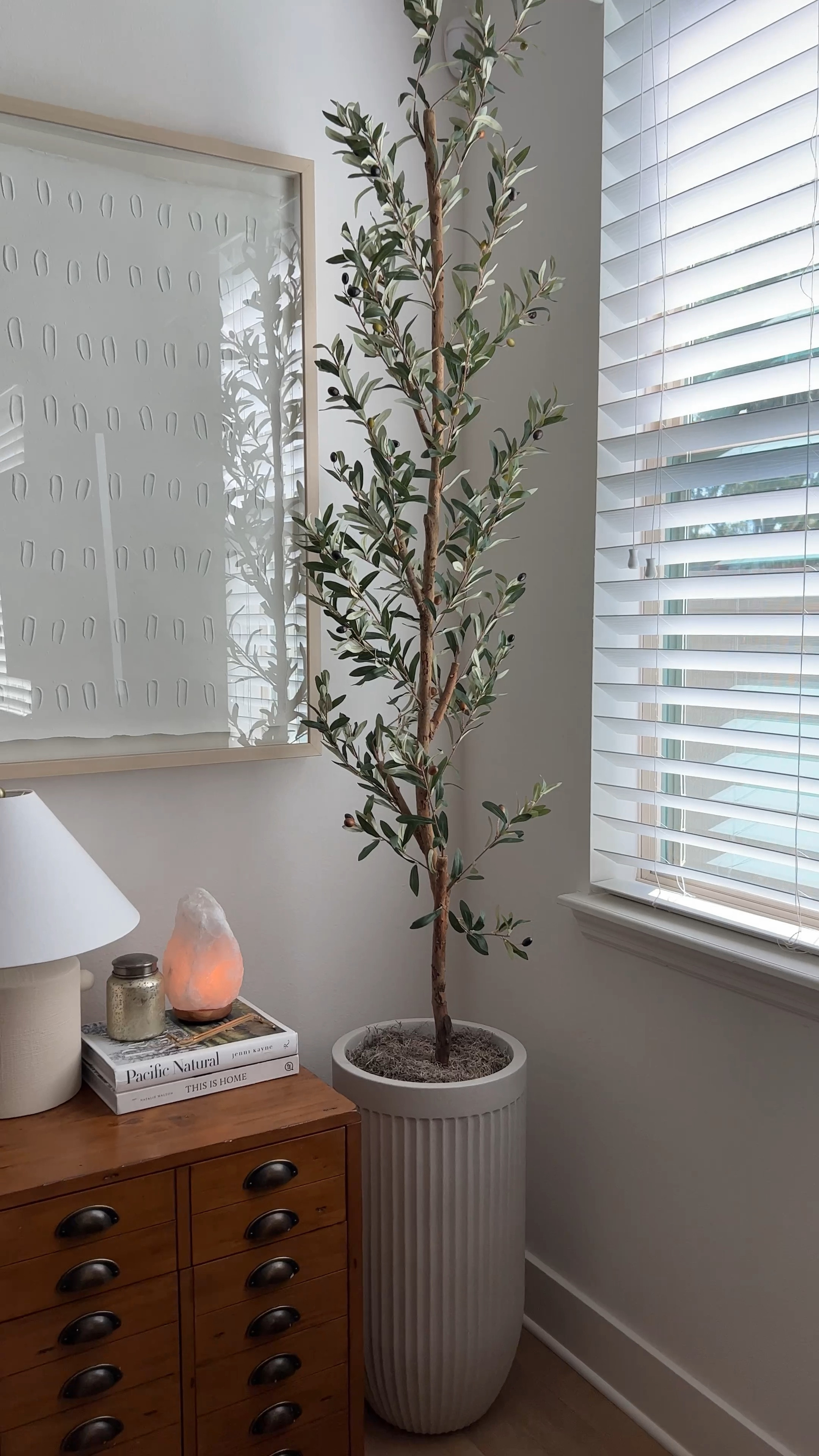 Updated my living room corner with a faux olive tree! 

#LTKhome #LTKSeasonal #LTKstyletip