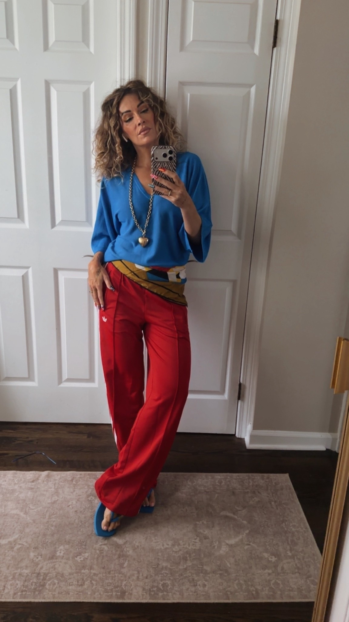 I am wearing the Adidas originals loose fit Firebird track pants, which I cannot find. The ones I linked are similar!