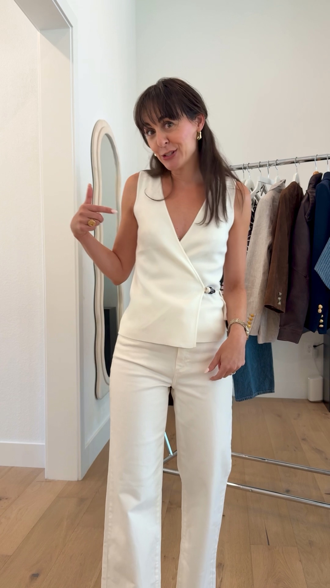 White Won’t Make you Look Wide

Stop thinking you can’t wear white. This is such a flattering outfit. The perfect soft stretchy opaque white jeans and matching vest that moonlights as a sleeveless top.
