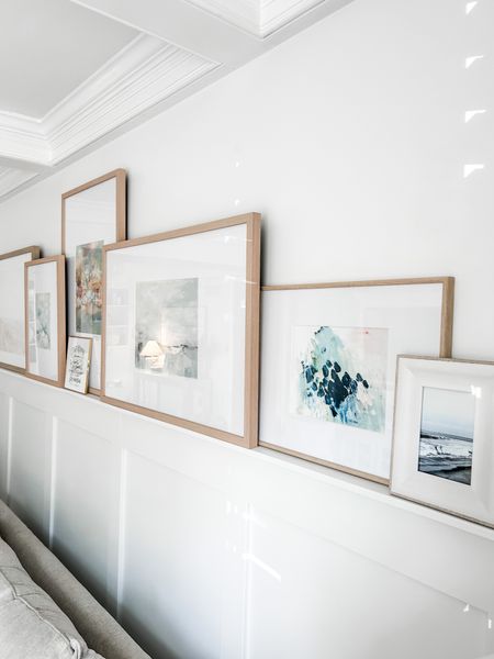 Love how these light wood natural tone gallery frames from Target turned out on our DIY picture ledge in the living room!
We used two of the 
20” x 30” light wood frame matted to 11” x 14” and one of the 
16” x 20” light wood poster frame
11” x 14” frame matted to 5” x 7”

Living room decor, picture ledge, gallery frames, light colored wood frame, gallery frame with oversized mat, abstract art prints, coastal art print, Spring decor, Spring art. Art decor for the wall behind the sofa, wall art, wall frame. Picture frame, large photo frame, poster frame. 
#livingroom #pictureframe #frame

#LTKhome #LTKFind #LTKstyletip
