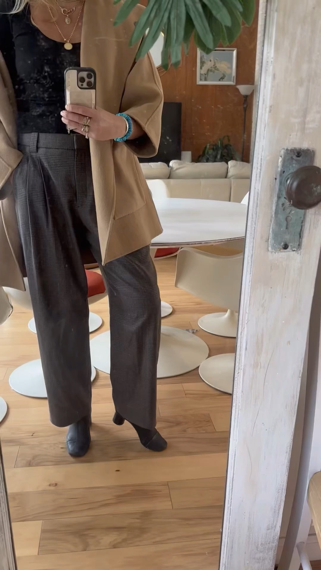 Wool trousers, camel coat, black tee, sock booties, black boots 

College professor first day back on campus outfit👓💋.  

Pants (on sale!) size 6
Tee: medium
Booties: TTS 
Coat: small 

#LTKFind #LTKworkwear #LTKbeauty