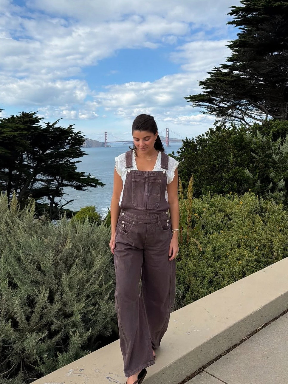 [9/15/26] from our trip to California 🤎 such a cute fall transitional outfit | wearing small in overalls! I’m 5’2 and 25 weeks pregnant in this photo. Normal size would be xs 🤍

#LTKgrwm #LTKootd #LTKSeasonal