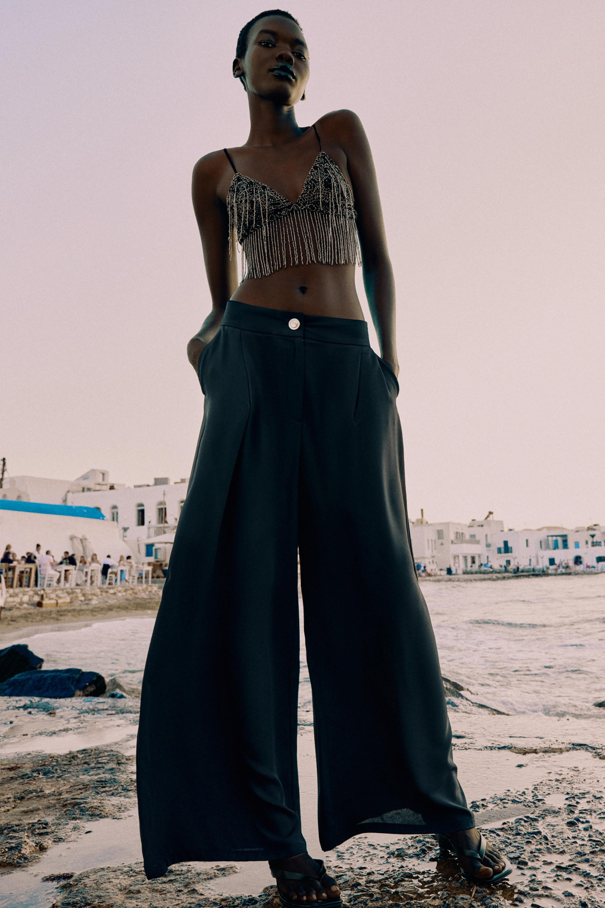 PALAZZO TROUSERS WITH GOLD BUTTON | Zara UK