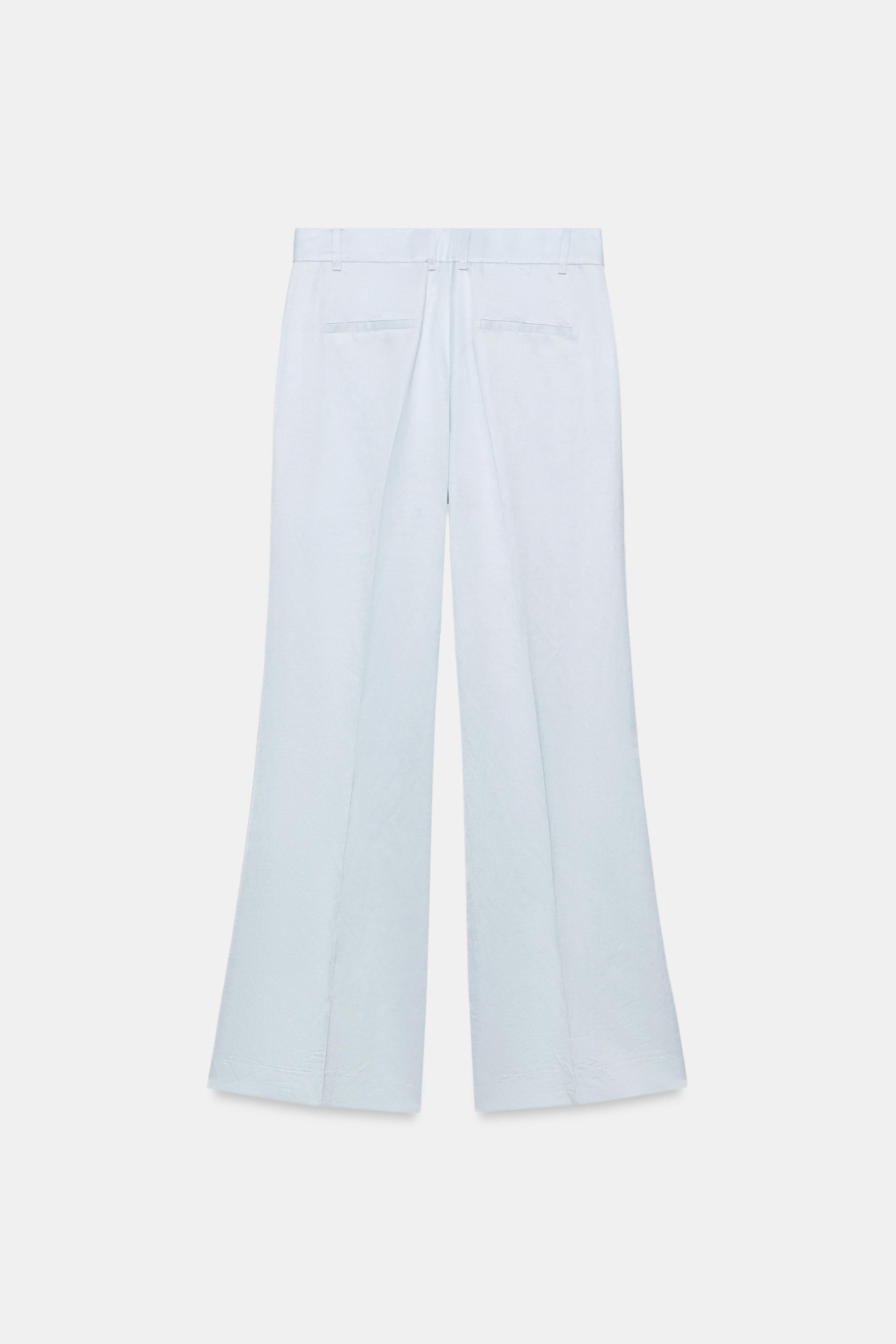 ZARA WOMAN COLLECTIONPants made of 38% linen blend yarn. Mid-rise waist with belt loops. Hidden s... | Zara US