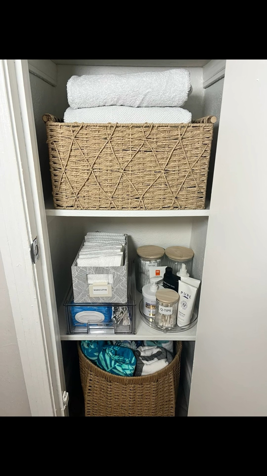 Small linen closet setup using clear bins for everyday items and deeper baskets below for bulky pool towels. Everything fits, stays visible, and is easy to grab.

These baskets were what the client already had. If I were recommending new ones for linens or towels, I’d suggest lined or treated options. I’ve linked similar styles below. 

#LTKHome