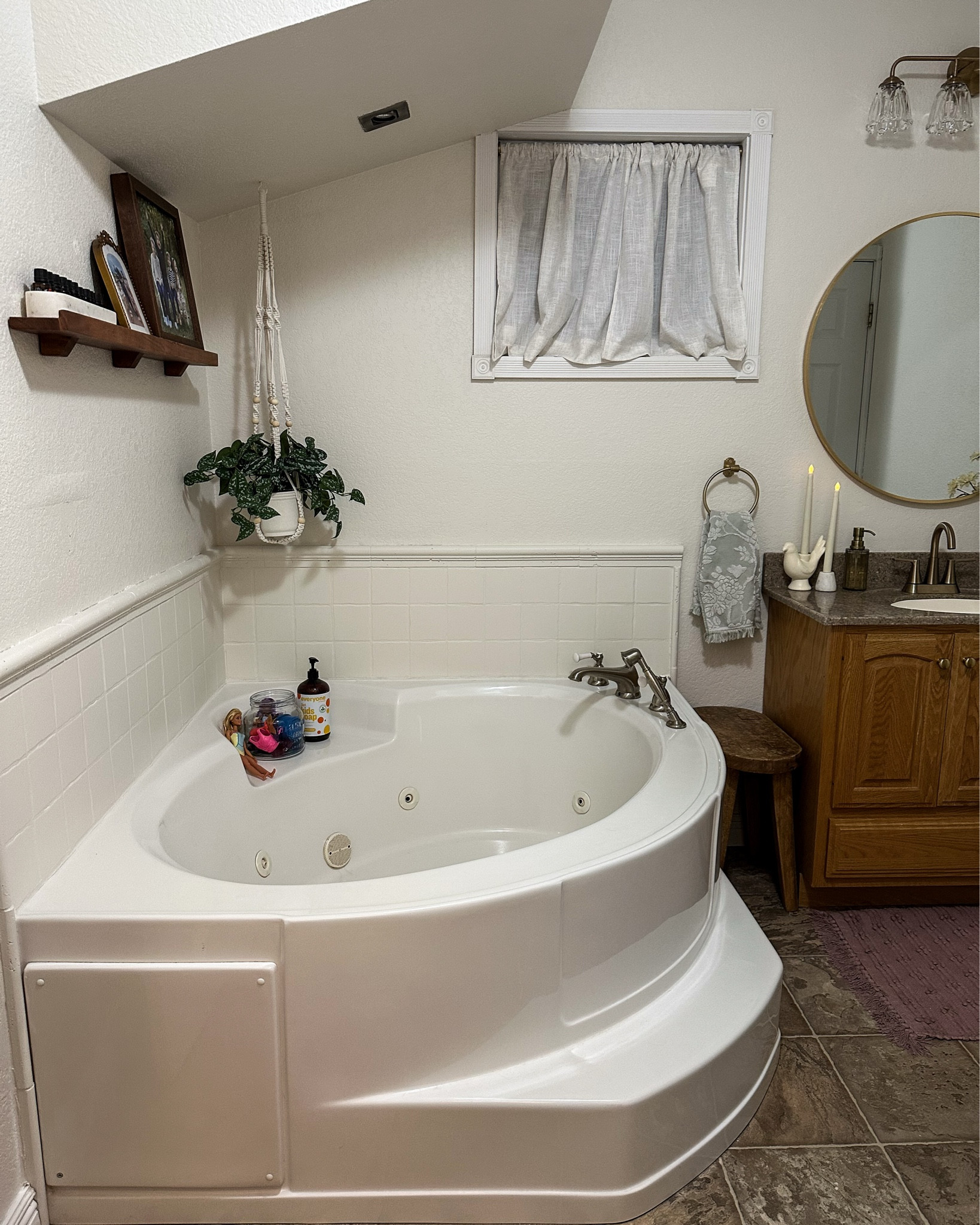 A “quick” bathroom redo! It took me super long to paint..and to convince my husband to hang up everything. 🤣

Paint color: SW Shoji White
I kept: Vanity and countertop, flooring, tub.
I replaced: Light, mirror, faucet, vanity knobs.
I added: A shelf, some faux plants, love. 
🥰

#LTKHome #LTKFamily #LTKFindsUnder50