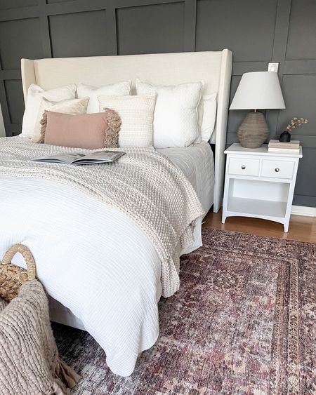 Bedroom design. Area rug. Upholstered headboard. Bedframe. Table lamp. Duvet cover. Throw blanket.

#LTKVideo #LTKsalealert