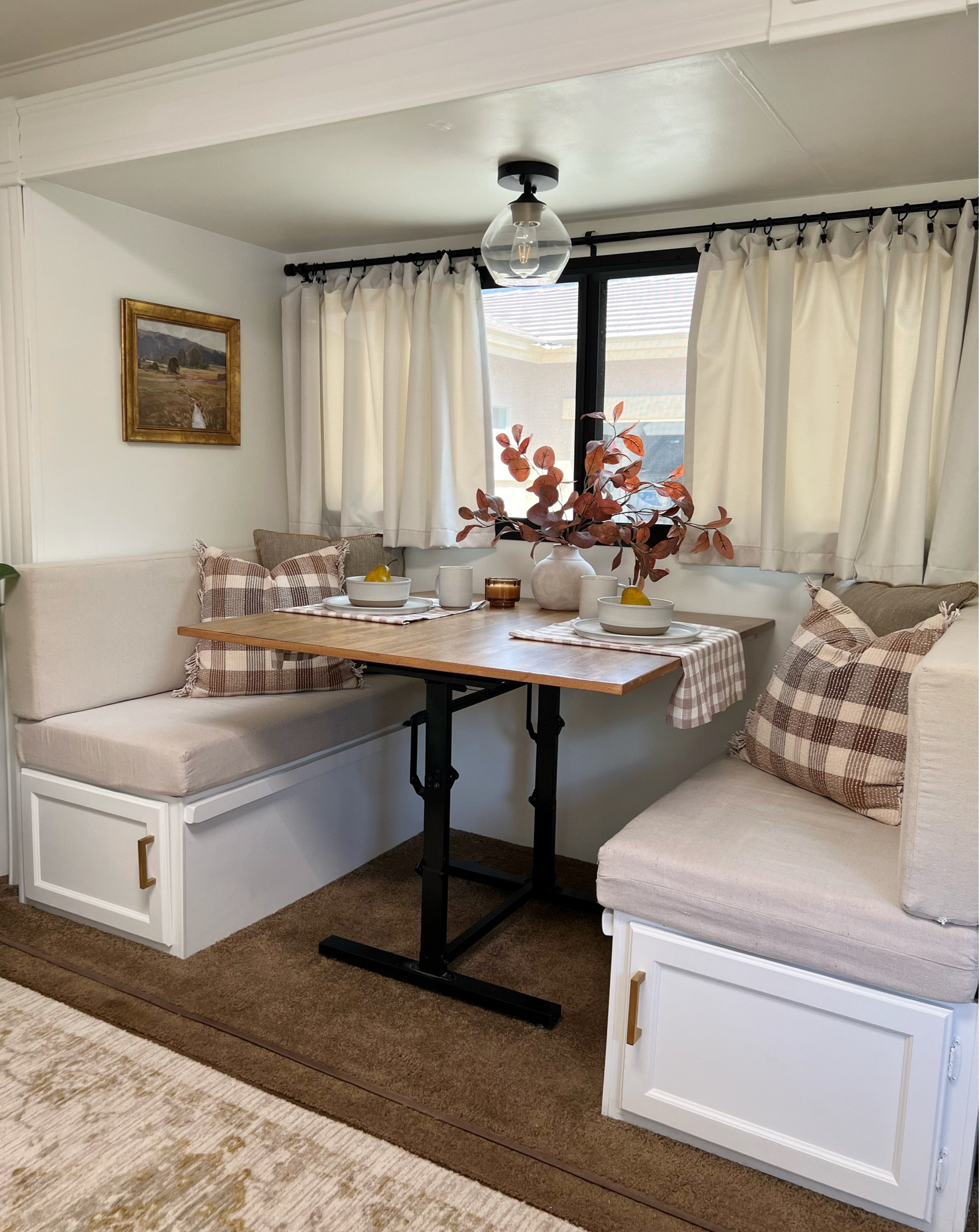 Camper dining space decorated for fall with affordable finds from Target. RV, Threshold, Studio McGee, Hearth & Hand, throw pillow, candle, area rug, faux plant, floral arrangement, napkin, wall art, picture, artwork, plaid, gingham, modern farmhouse, cottage, fall decor, lighting, banquet, breakfast nook, ding room, camping



#LTKstyletip #LTKhome #LTKSeasonal