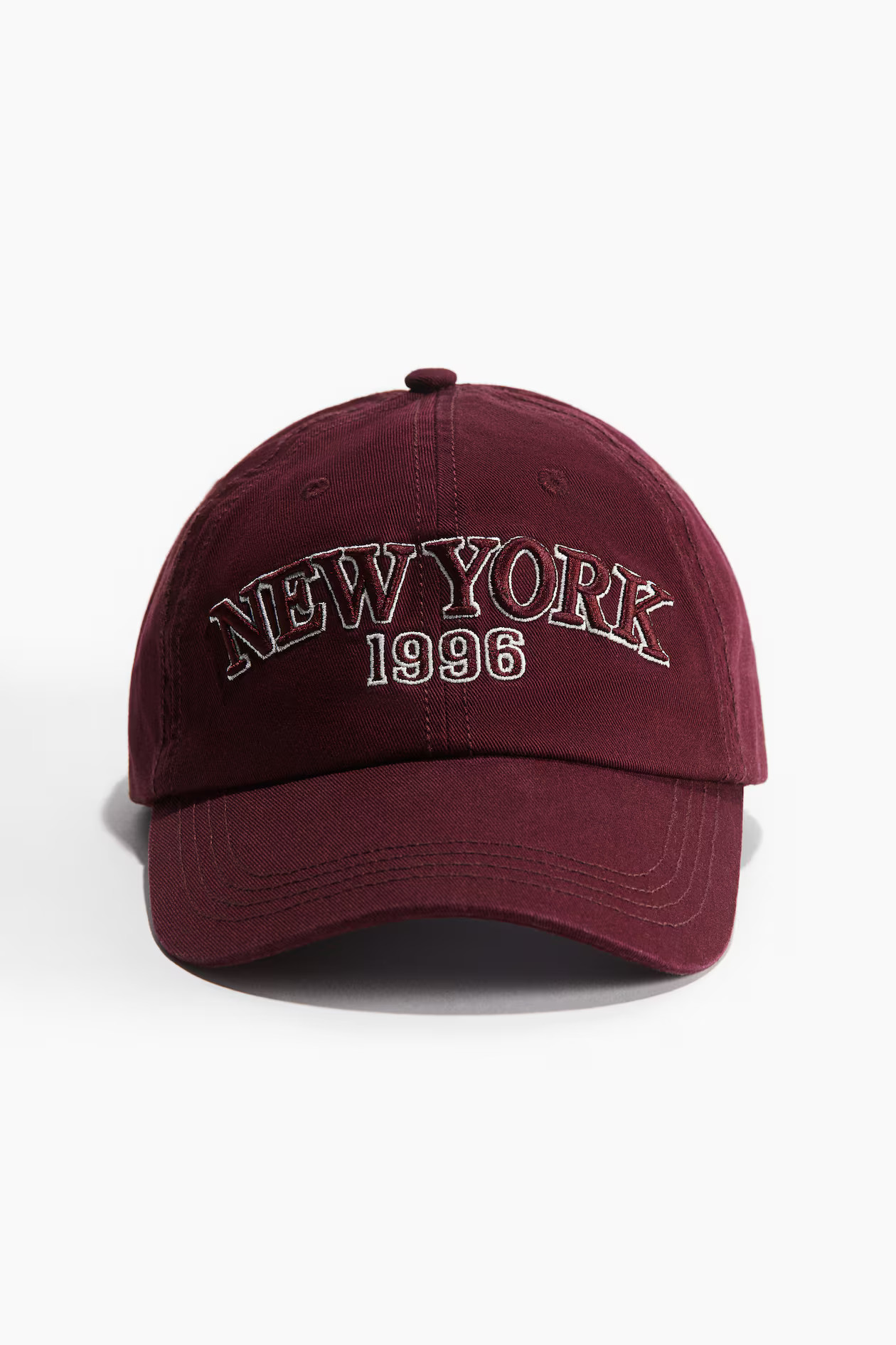 Embroidered cap - Burgundy/New York - Ladies | H&M GB | H&M (UK, MY, IN, SG, PH, TW, HK)