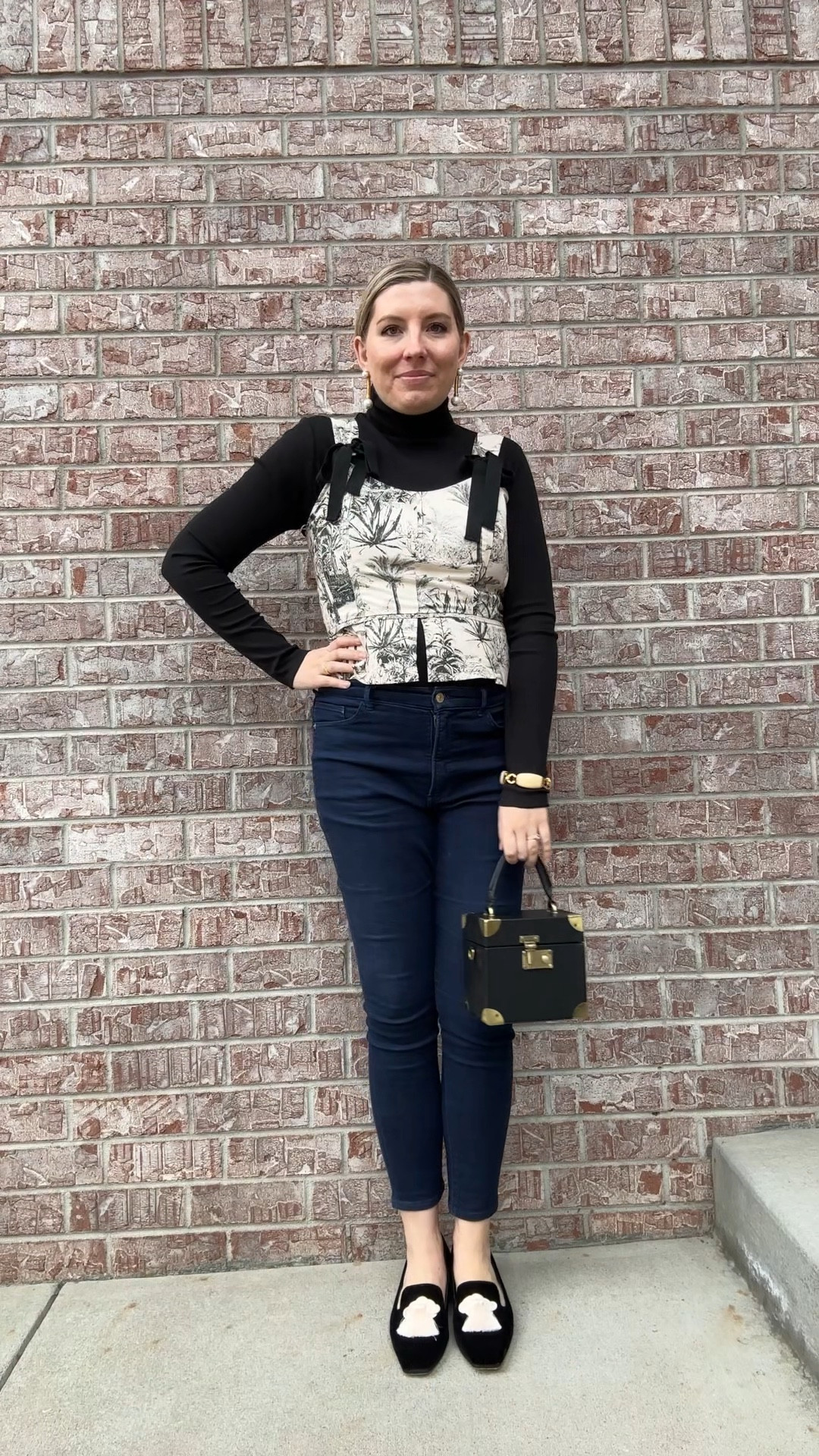 Rocking several of my favorite pieces from fall all together today. ✨ 

Toile Top - Dillards (linked)
Turtleneck - Lauren Ralph Lauren (linked)
Earrings - Lele Sadoughi (linked)
Jeans - Express (similar linked)
Bag - Dillards (linked)
Shoes - Dillards (linked)
Bracelet - Vintage J Crew

#LTKWatchNow #LTKShoeCrush #LTKSeasonal
