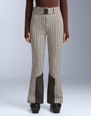 OYSHO Water-resistant printed high rise flare stretch ski trousers in light pink | ASOS (Global)