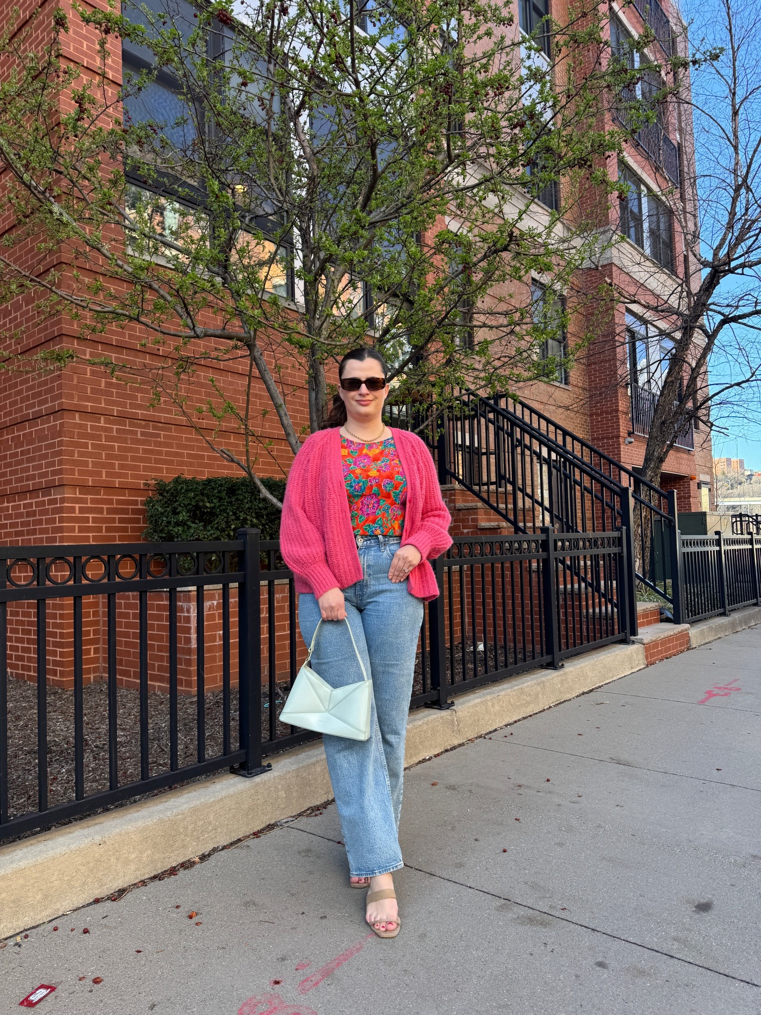 A fun and casual outfit featuring a pink cardigan over a floral tank top and relaxed denim. The combination of bright hues and classic accessories, like a seafoam green bag and nude heels, makes this look both playful and put-together. Spring outfits are so fun

#LTKSeasonal #LTKFindsUnder100 #LTKStyleTip