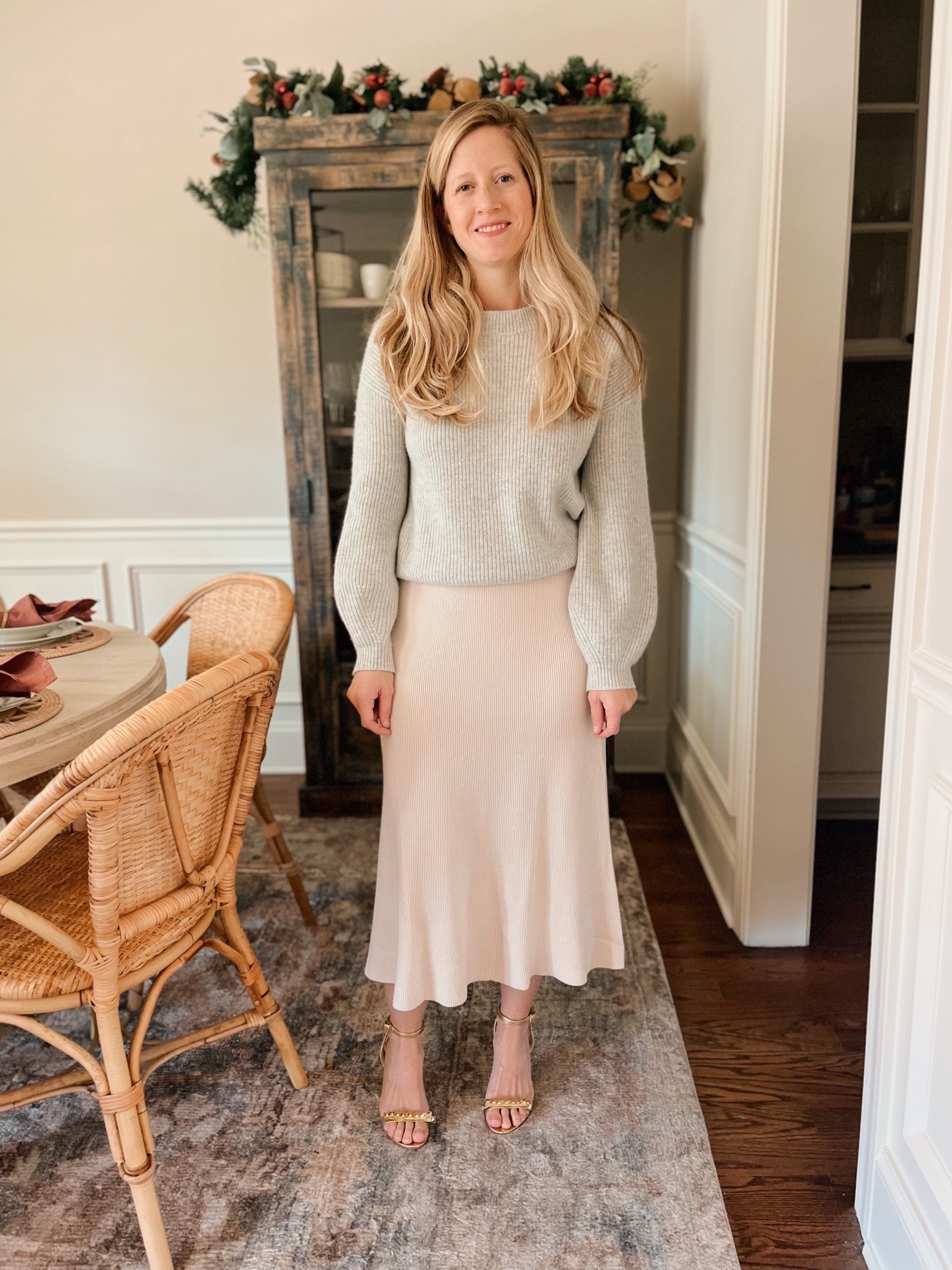sweater skirt - knit skirt -
sweater set - skirt set - winter white - cream skirt - how to style a sweater skirt - holiday outfit - date night outfit - classic style - sweater outfit - winter date night -
mango skirt - grey sweater - gold heels

#LTKHoliday #LTKstyletip #LTKfindsunder100