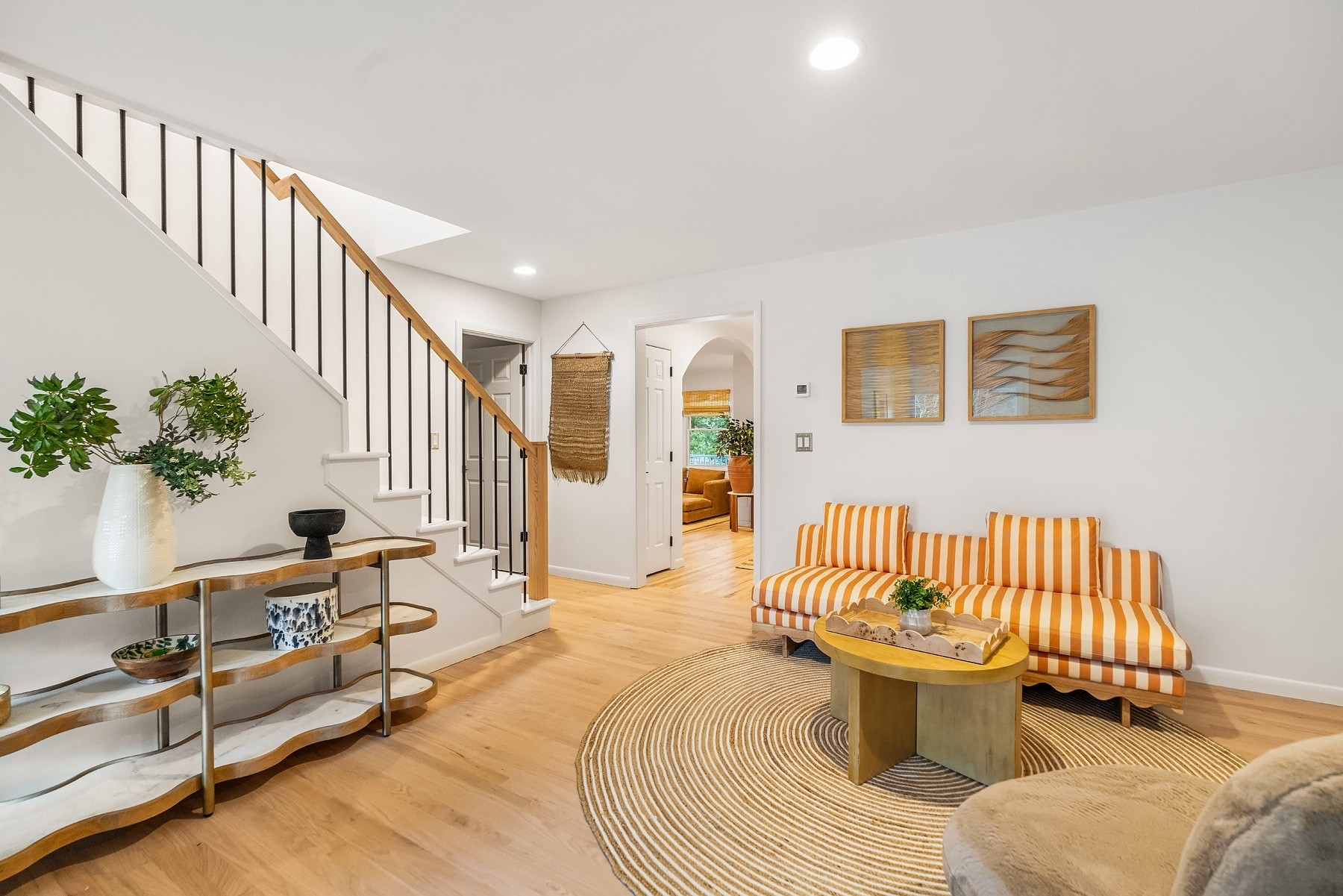 Mixing high + low in this Hamptons living room. From the striped couch to the round jute rug, every piece balances coastal living with modern style. Shop some of the exact finds here.

#HamptonsHome #CoastalLivingRoom #ModernCoastal #InteriorInspo #NaturalTextures #HomeDesignInspo



#LTKHome