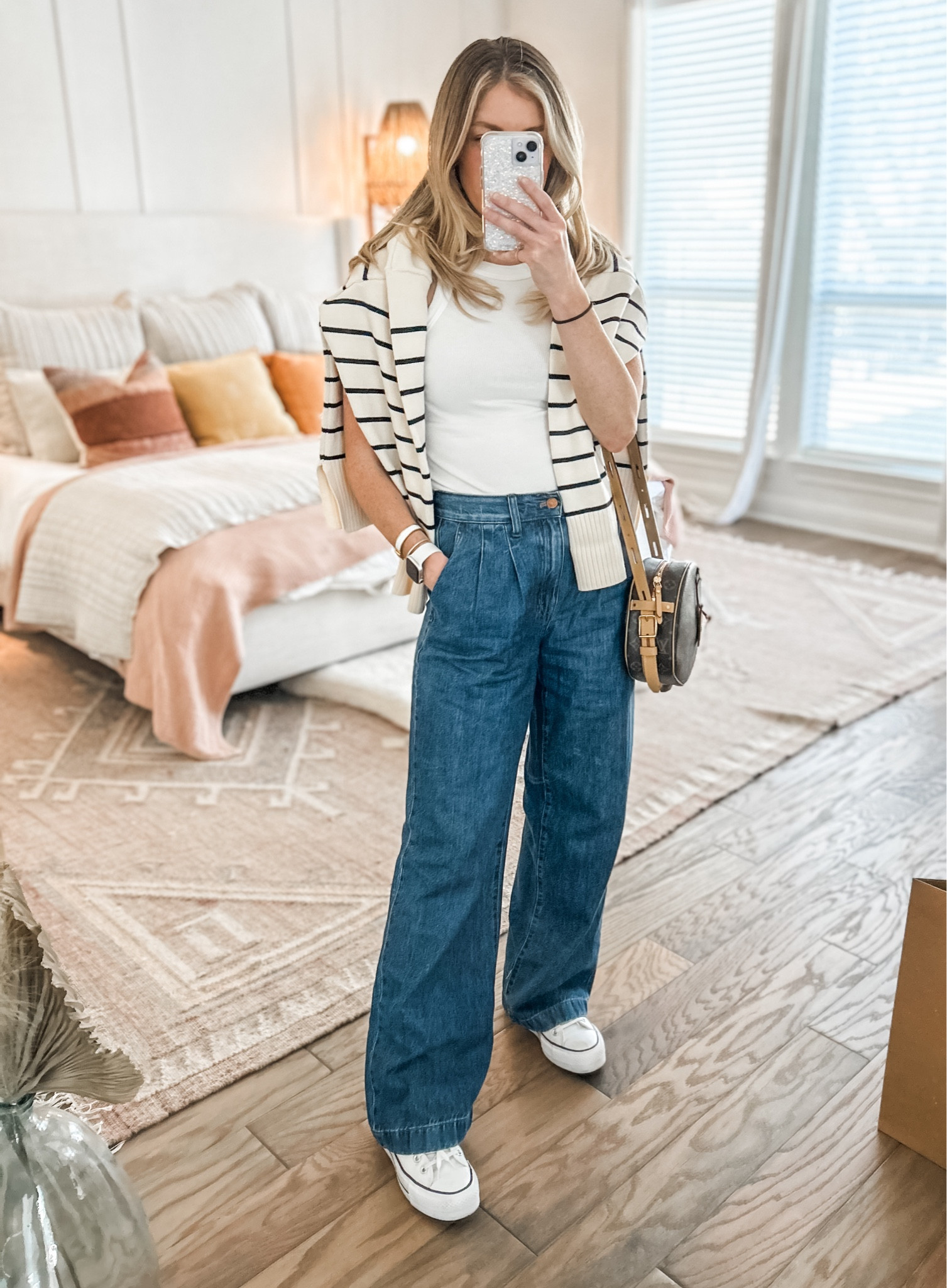 wide leg pleated denim (on sale!) size down. striped sweater. white basic ribbed tank. platform converse. casual ootd. casual office outfit. errands outfit. casual style  

#LTKworkwear #LTKsalealert #LTKtravel