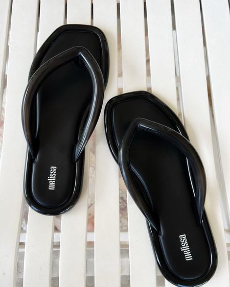 Puffy square toe flip flops by Melissa. They’re water proof for beach and pool and cute to wear with vacation or casual outfits. Exact match in other colors linked below as well as some similar black flip flop sandals.

#LTKfindsunder100 #LTKSeasonal #LTKshoecrush