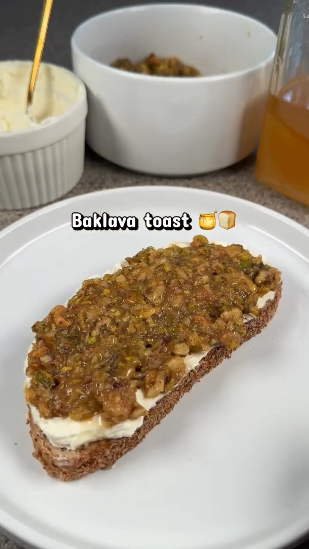 Dessert lovers you’ll want to save this baklava toast recipe! 🍯🍞

@stonehousebread 9 grain sourdough has a naturally nutty flavor and pairs perfectly with the baklava topping! 

Ingredients:
Stonehouse 9 grain sourdough 
Softened cream cheese
¼ cup chopped walnuts
¼ cup chopped pistachios
4 tablespoons melted butter
2 tablespoons brown sugar
2 tablespoons honey 
1 teaspoon cinnamon

Directions:
Toast your sourdough
 
In a bowl, combine the walnuts, pistachios, brown sugar, butter, honey, and cinnamon
 
Spread cream cheese onto the sourdough
 
Add the baklava topping

Drizzle with more honey
 
Enjoy! 
 
@stonehousebread is available at @meijerstores @krogerco and @wholefoods across Michigan!
 
#stonehousebread #leavenostoneunturned #traversecitymi

#LTKvlog #LTKHome #LTKfoodie