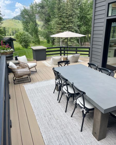 HOME \ outdoor deck ready for the 4th🇺🇸

Dining table
Rug
Furniture 
Umbrella 
Accent chair 

#LTKSeasonal #LTKhome