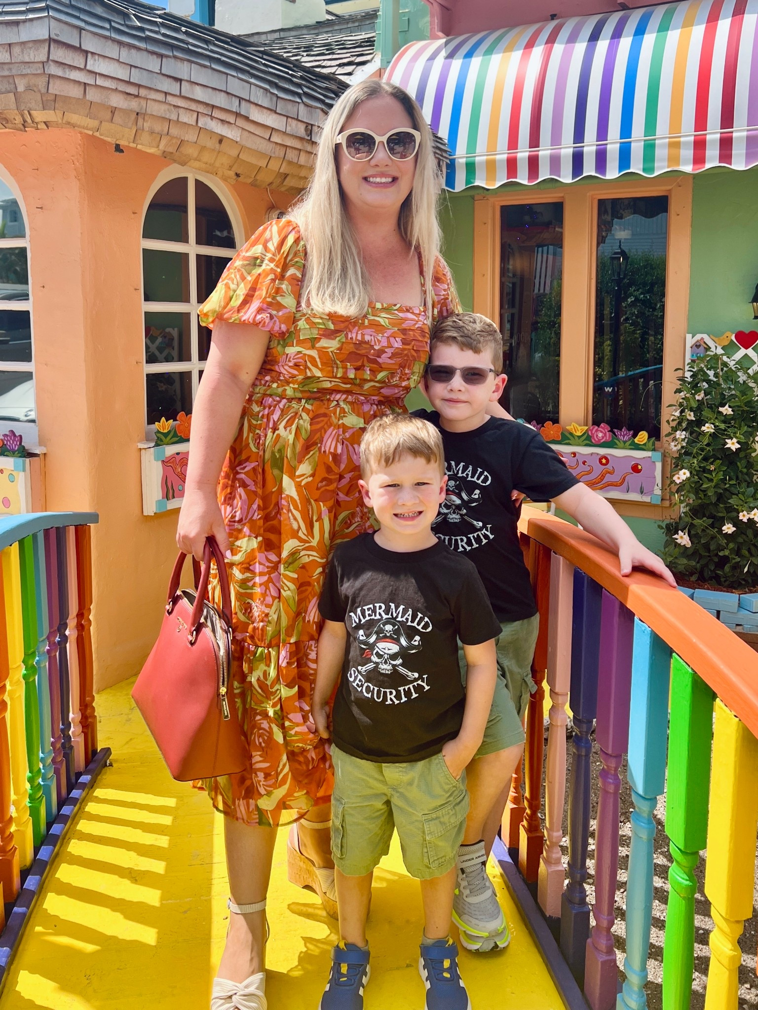 Love this beach spring break family outfits. Orange floral dress for mom and cute sea worthy shirts for boys. Perfect for this fun eclectic restaurant on Florida's Captiva island. Spring break vacation. Summer dress. 

#LTKKids #LTKdayinmylife #LTKTravel