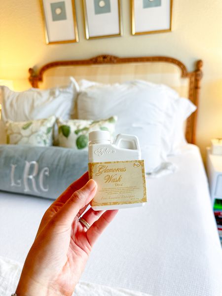 My favorite little luxury! Washing our sheets with some of this fabulous wash! Makes our sheets smell heavenly! Linked my FAVE sheets as well :) our headboard is antique and artwork was a DIY!

#LTKstyletip