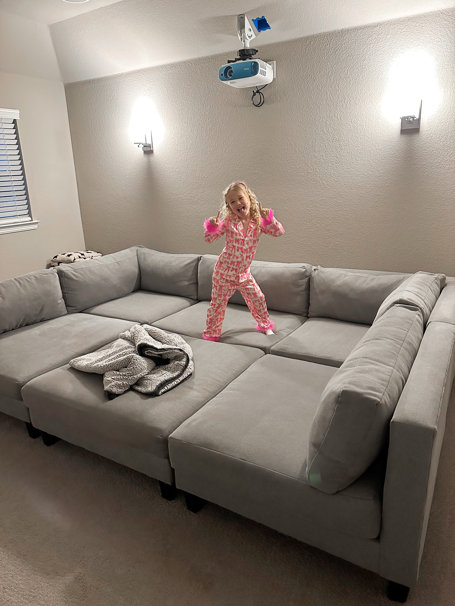 Our movie room couch is the coziest! It’s held up for 4 years now!

Home decor, sectional, couch, movie room, media room, movie night

#LTKHome #LTKKids #LTKFamily