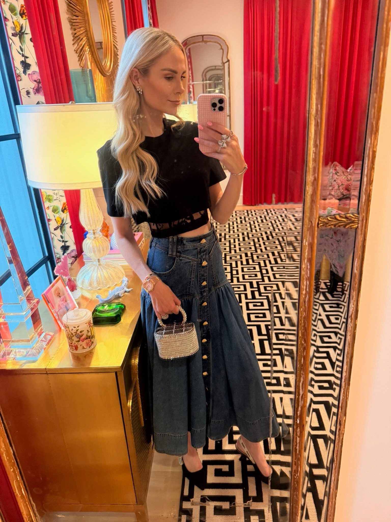 Daily Look 🖤 Found my exact denim skirt on sale! A look alike version of my top by the same designer on sale over 50% off! My exact evening bag and favorite every Jewelery all linked! 

#LTKootd #LTKmomlife #LTKOver40