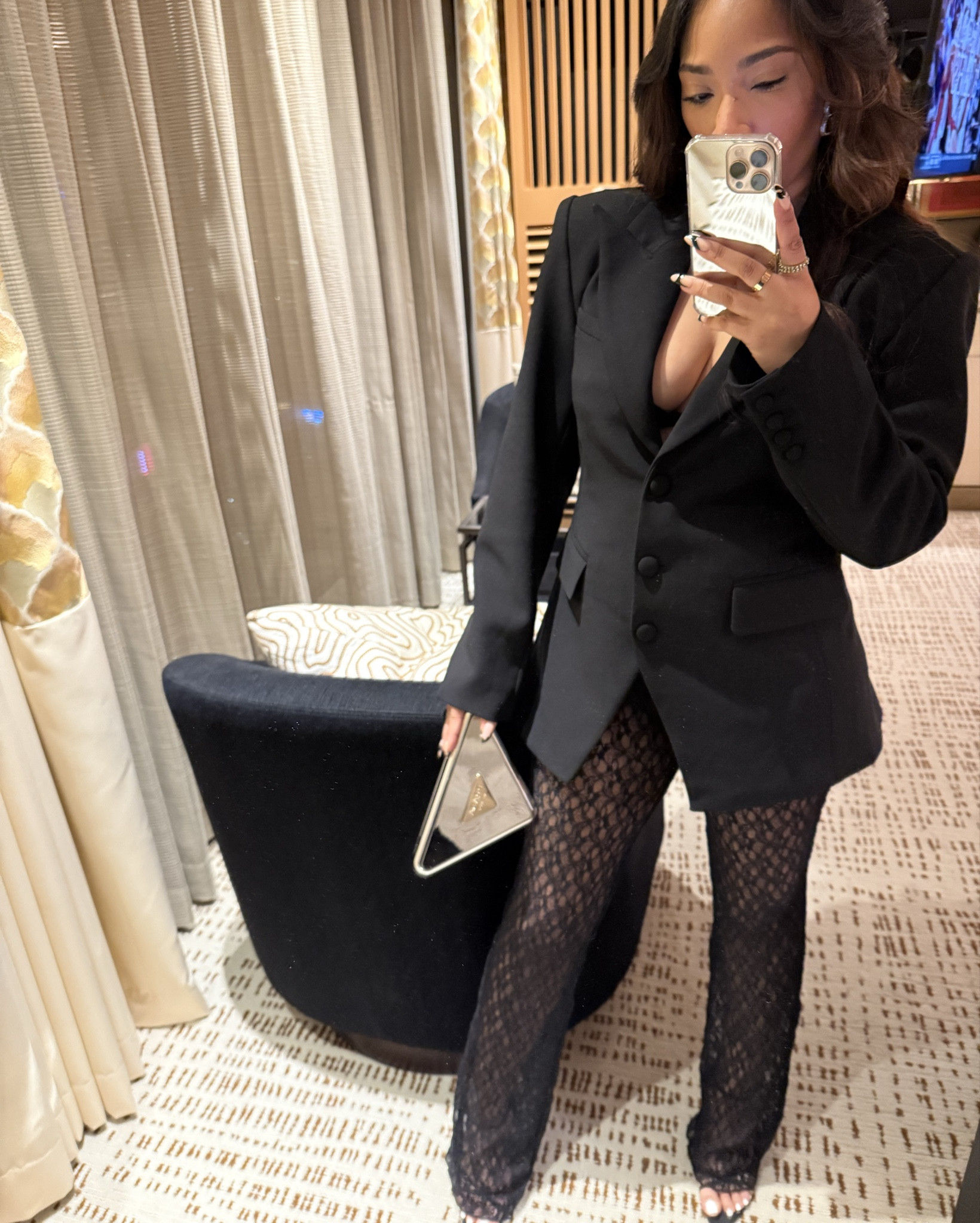 The mirror always gets the look first. 

Y’all know I always highlight something I’m wearing so here we go. This @pradabeauty lipstick clutch is a mixed metal girl’s best friend. There is a re-fillable lipstick case that comes inside along with 4 lipstick shades and you can empty those contents and use the clutch for a night out. It can’t hold much but it can hold the essentials: your cards, lipstick/lipgloss, a car key, a mint…smaller items. 

#LTKGiftGuide #LTKBeauty #LTKStyleTip