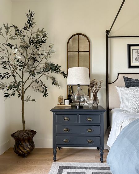 My nightstands, arch mirrors and olive tree are on sale! My mirror is one of the lowest prices I’ve seen! And the nightstand color is a soft black with a small bit of distressing that gives it a vintage vibe 🥰

#LTKsalealert #LTKCyberWeek #LTKhome
