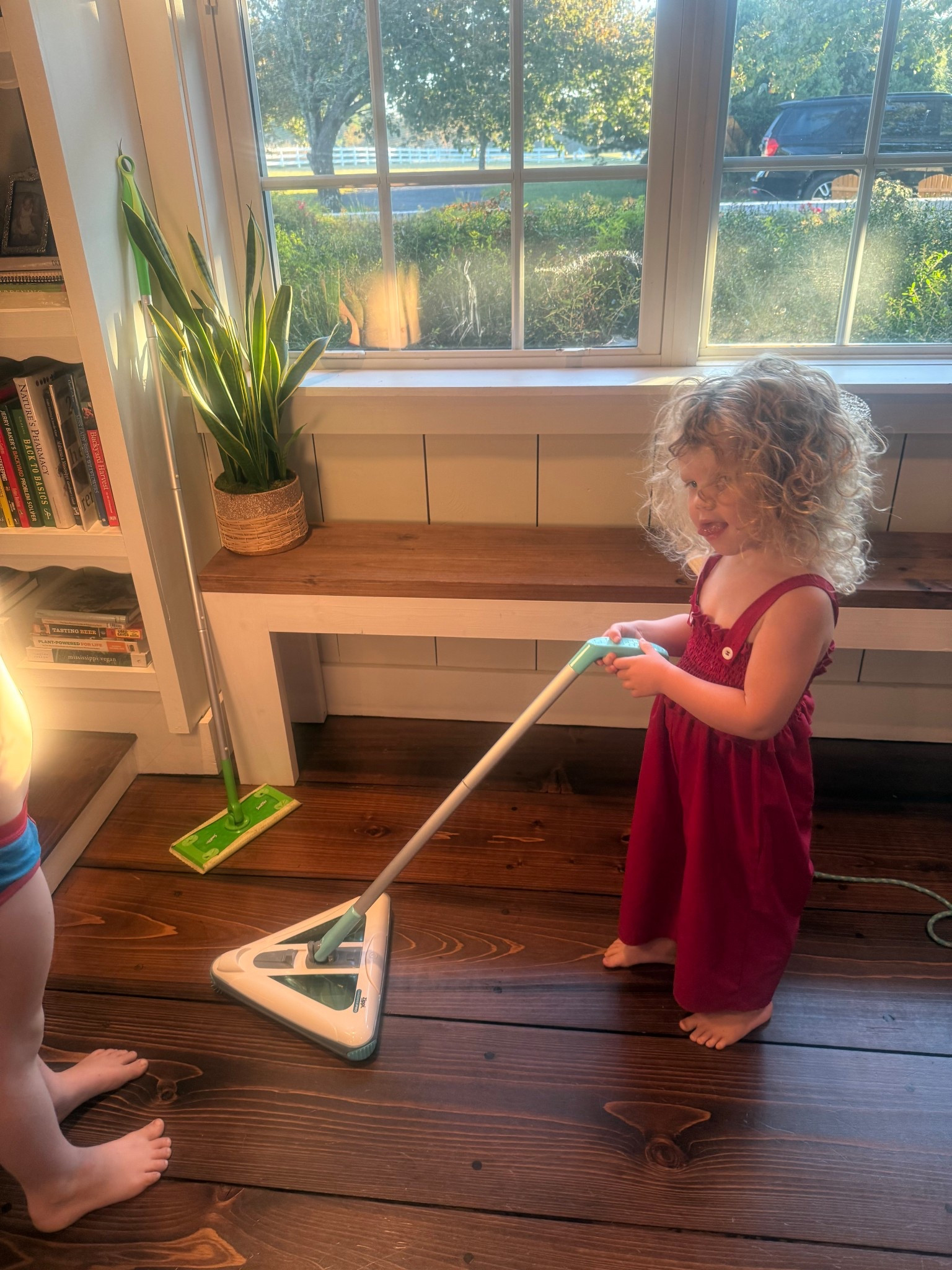 Rechargeable vacuum for toddlers . Light weight and adjustable handle. We have one with light on it