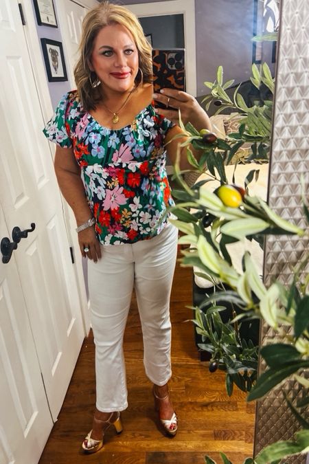 Florals for spring? Ground breaking 🤣
This floral top is adorable! It would great as part of a work outfit or a date night outfit. Paired here with a fresh pair of white jeans and retro inspired gold platform sandals. Short runs small, consider upsizing.
Spring outfits, Easter outfits, white jeans, vacation outfits, work outfits, Good American, heels, Old Navy 

#LTKover40 #LTKmidsize #LTKsalealert
