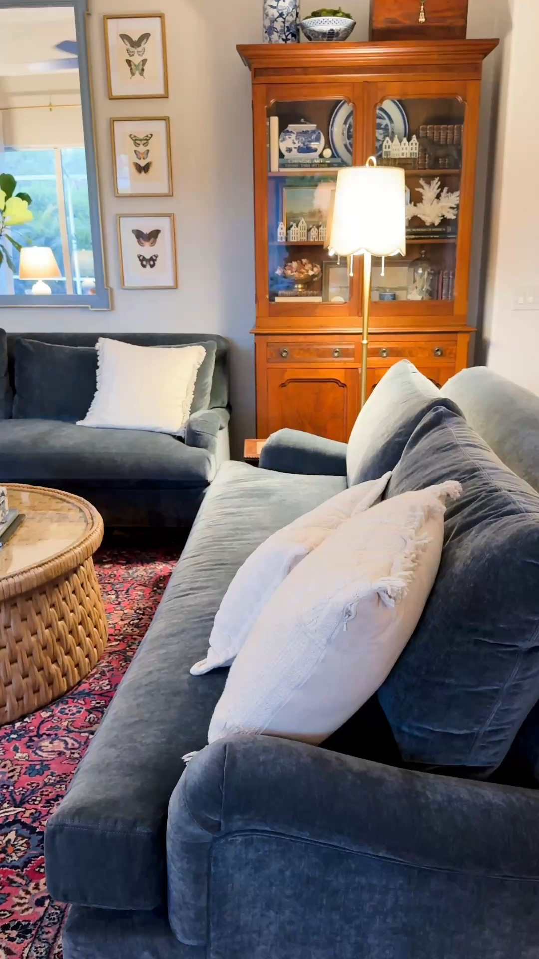 These gray blue sofas are perfection! Pottery barn Rustic Slate Chenille fabric is soooo soft! The round rattan coffee table is the perfect accent 😊