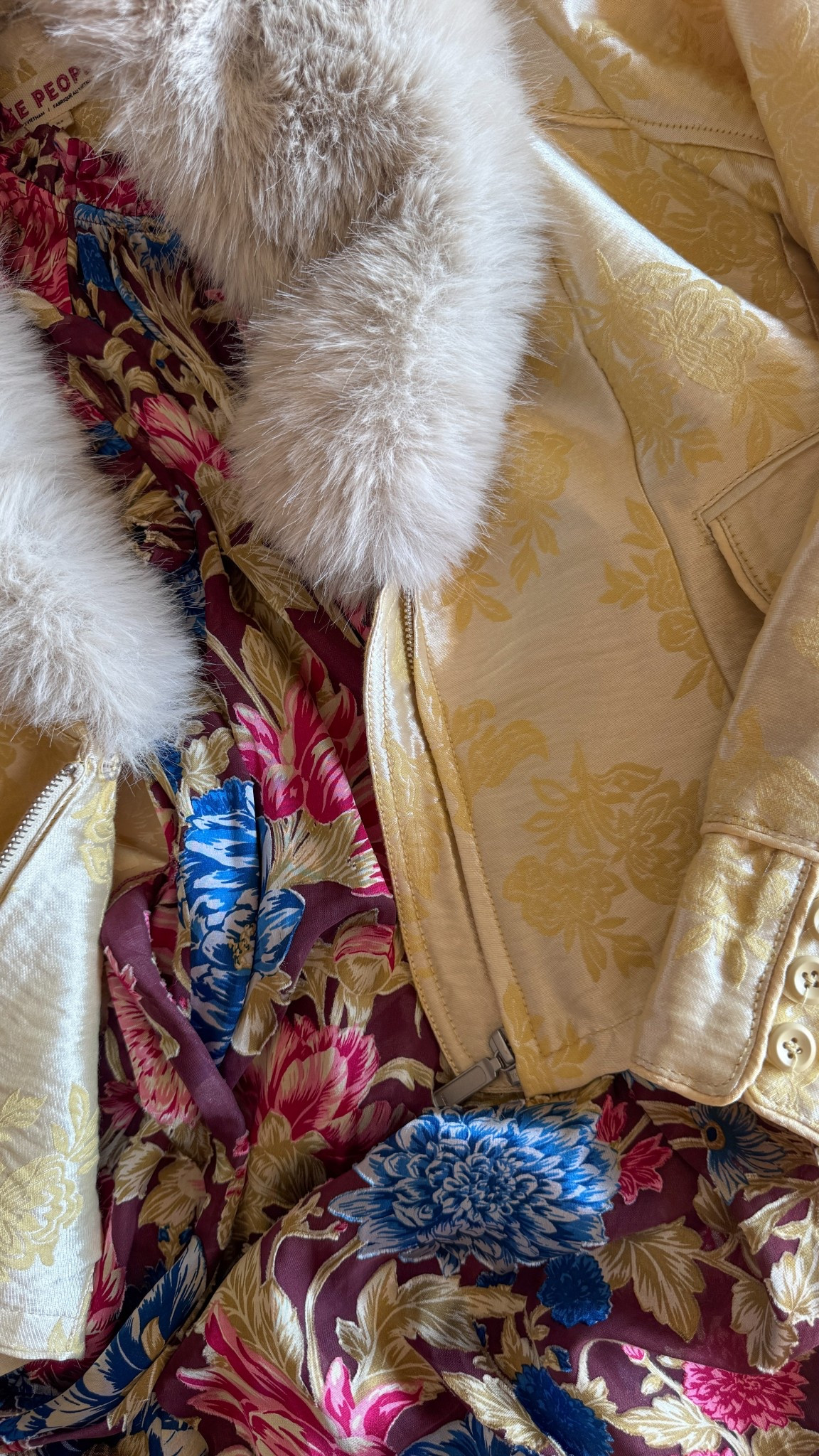 Love this little faux fur jacket and the fur collar is removable  