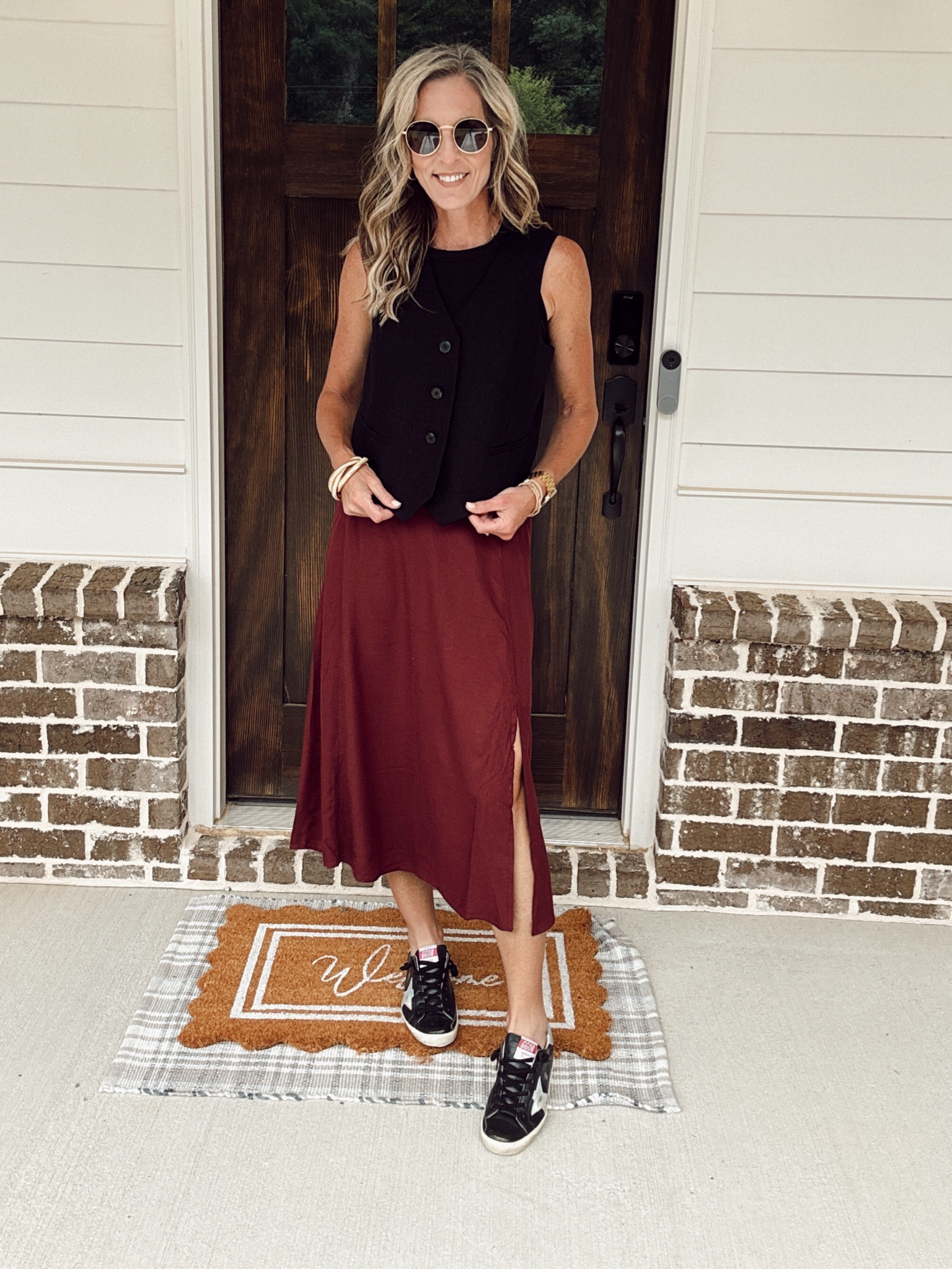 Old Navy lightweight pull on skirt- so versatile and looks great styled so many ways - 50% off today making it $17 - paired here with a linen blend vest with a black tank - linked lsome great options under $25 - wearing an xs in skirt (workwear) 