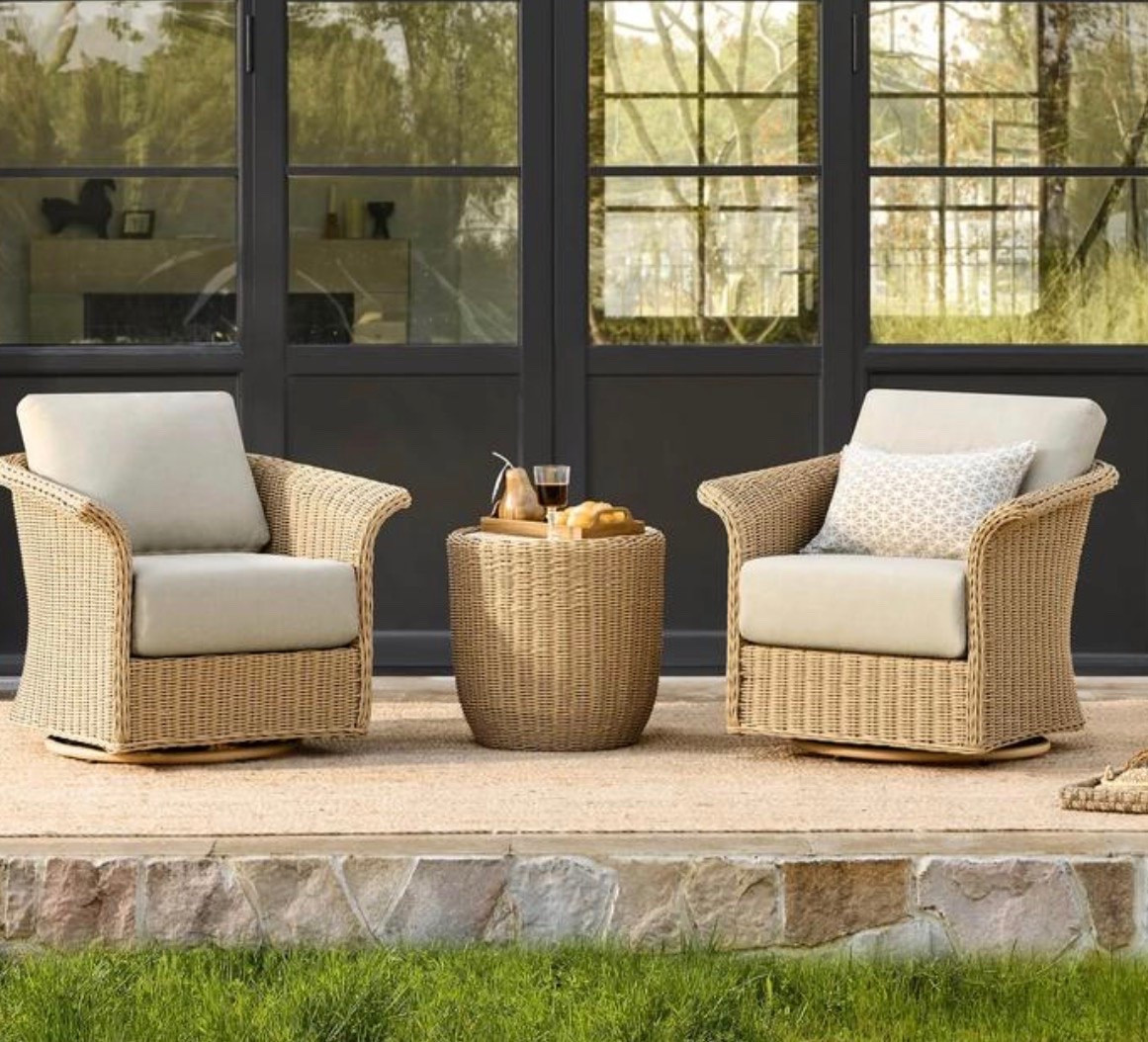 Hand woven wicker outdoor bistro set; table and a set of 2 swivel chairs that swivel 360 degrees!