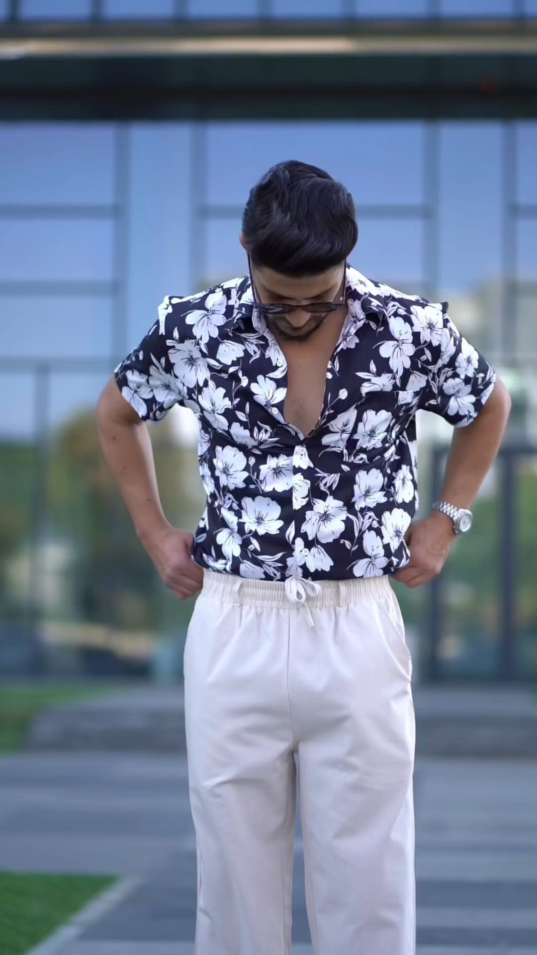 Effortless summer vibes in a black and white floral shirt, paired with light linen trousers and crisp white sneakers. Perfect for a casual yet stylish look.

#LTKFallSale #LTKVideo #LTKSeasonal