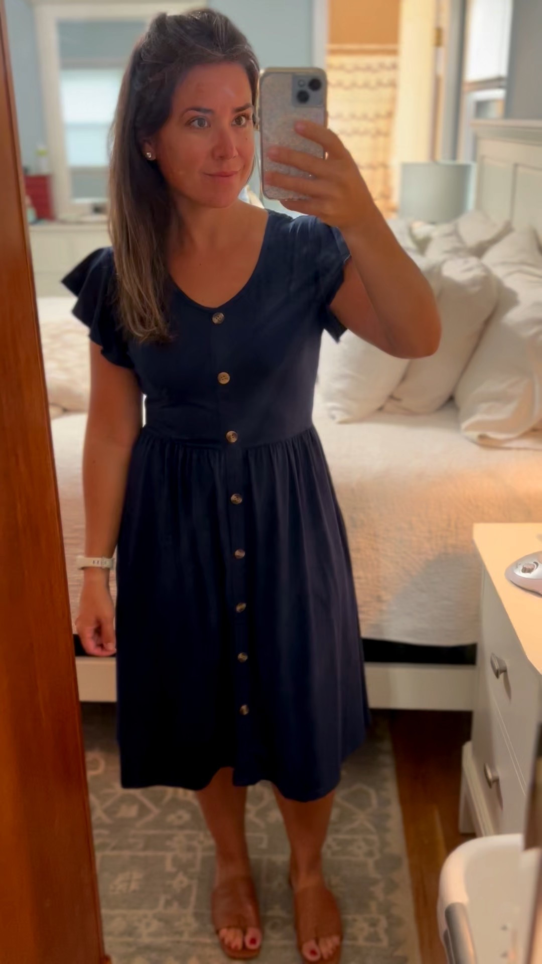 This dress is the perfect transition item for summer to fall but also spring to summer. Lightweight and with ruffle sleeves- the stretchy fabric is soft and comfortable. Paired with a beige sandal, it is a great go-to dress for the workweek. I am wearing a size small in Navy Blue. 

#LTKFindsUnder50 #LTKPetite #LTKWorkwear