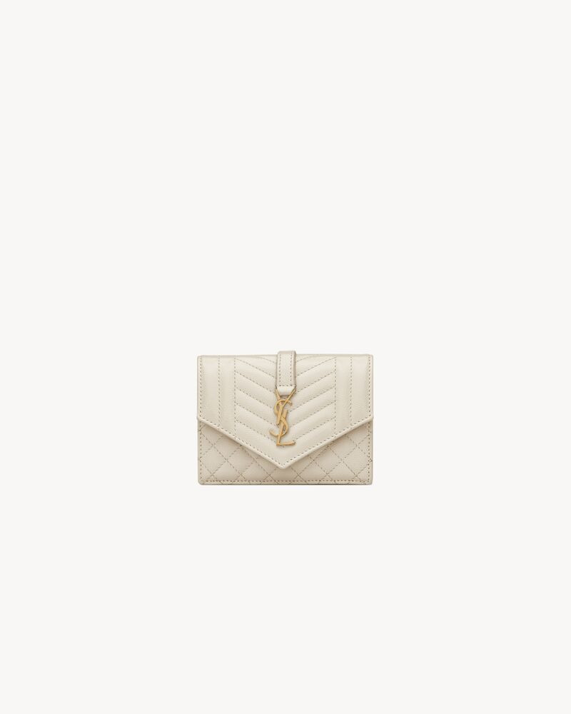 SAINT LAURENT MONOGRAM CARD HOLDER MADE WITH METAL-FREE TANNED LEATHER WITH ICONIC YSL METAL INIT... | Saint Laurent Inc. (Global)