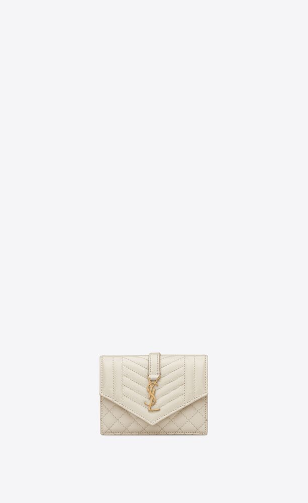 SAINT LAURENT MONOGRAM CARD HOLDER MADE WITH METAL-FREE TANNED LEATHER WITH ICONIC YSL METAL INIT... | Saint Laurent Inc. (Global)